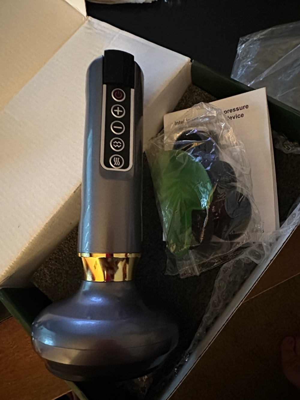 Handheld Electric Cupping Massager in Metallic Gray with Gold Accent